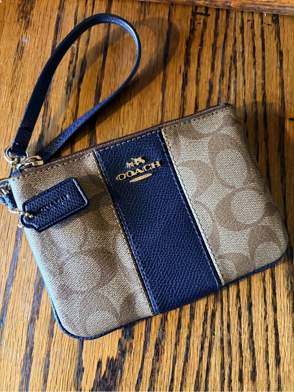 COACH Brown Signature Canvas Wristlet with Navy Stripe